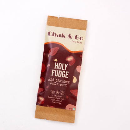 Chak & Go Holy Fudge Date Bites in a kraft paper pouch, displayed on a clean white background.